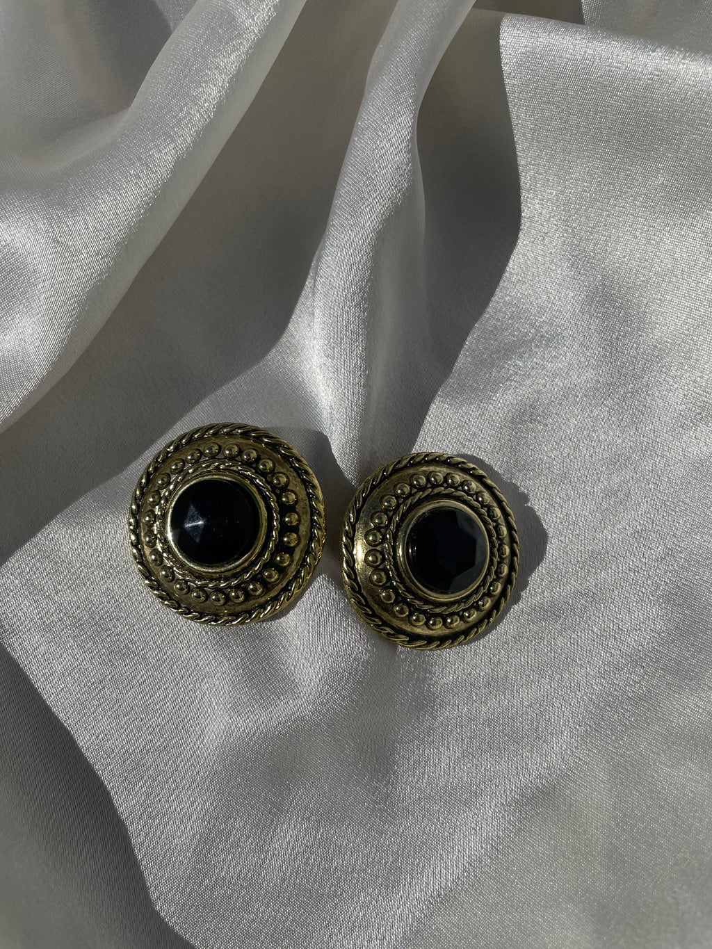 Brincos de mola dos anos 80