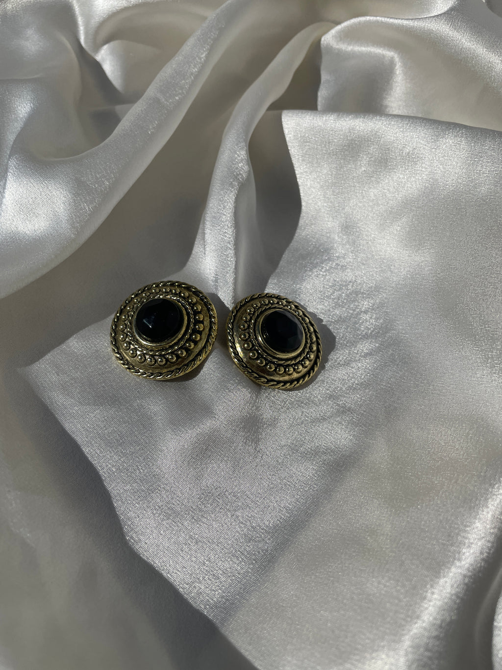 Brincos de mola dos anos 80