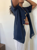 Camisa vintage azul feminina com transparência